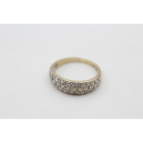 75 - 9ct gold diamond set band ring (2.5g) Size N 1/2