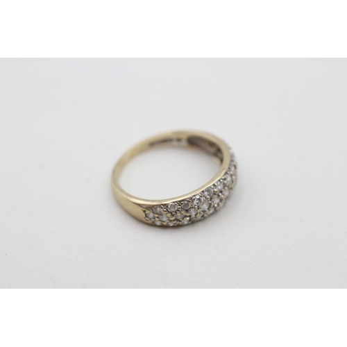 75 - 9ct gold diamond set band ring (2.5g) Size N 1/2