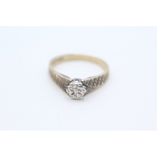 79 - 9ct gold diamond set solitaire ring (2.1g) Size M