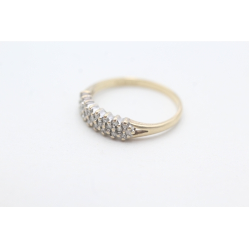 82 - 9ct gold diamond set band ring (1.6g) Size M