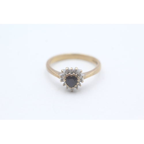 83 - 9ct gold diamond and heart cut sapphire set ring (2.6g) Size O