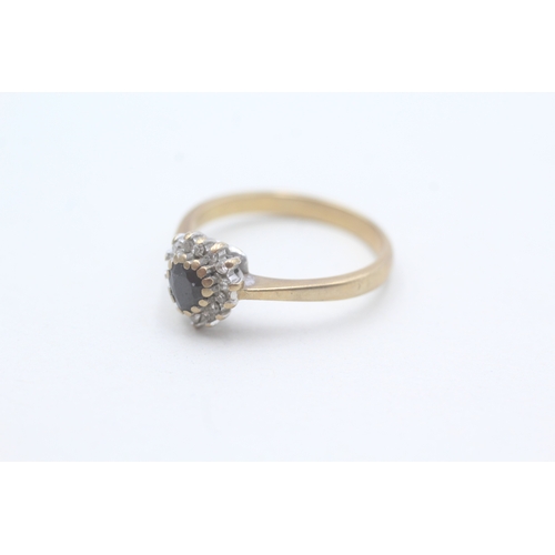 83 - 9ct gold diamond and heart cut sapphire set ring (2.6g) Size O