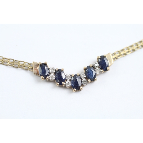 84 - 9ct gold sapphire and diamond row necklace (4.5g)