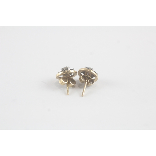 87 - 9ct gold sapphire and diamond flower stud earrings (1.9g)