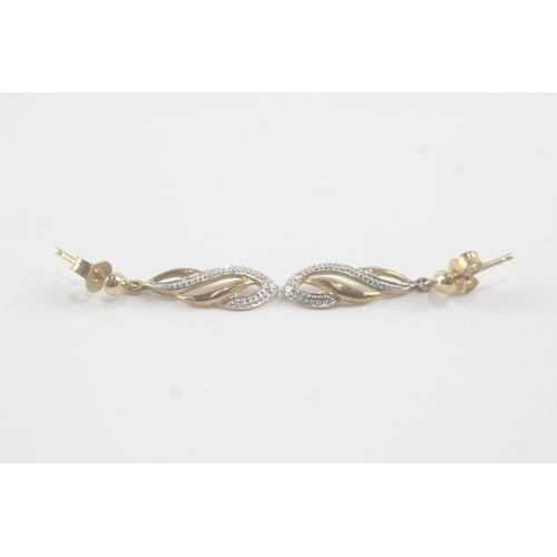 93 - 9ct gold diamond twist drop earrings (1.9g)