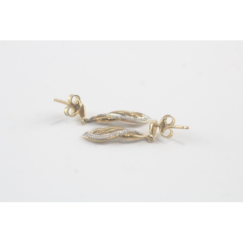 93 - 9ct gold diamond twist drop earrings (1.9g)