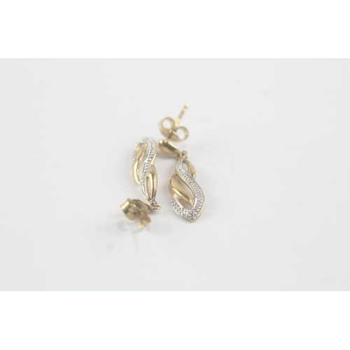 93 - 9ct gold diamond twist drop earrings (1.9g)