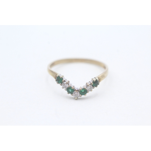 96 - 9ct gold diamond and emerald set wishbone ring (1.2g) Size P