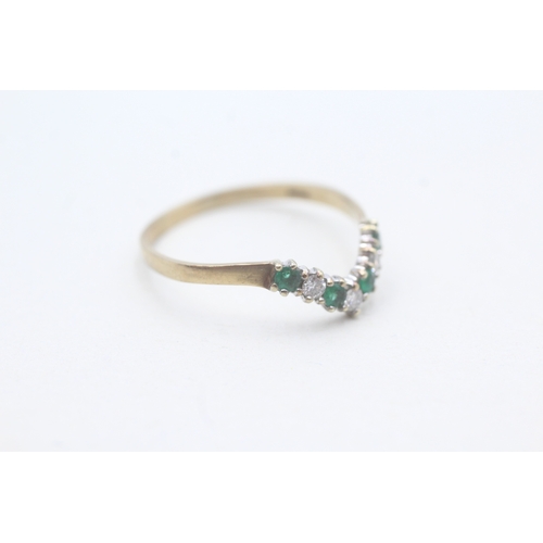 96 - 9ct gold diamond and emerald set wishbone ring (1.2g) Size P