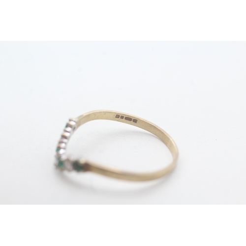 96 - 9ct gold diamond and emerald set wishbone ring (1.2g) Size P