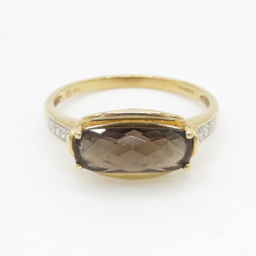 178 - 9ct gold faceted smokey quartz & diamond dress ring (2.6g) Size T