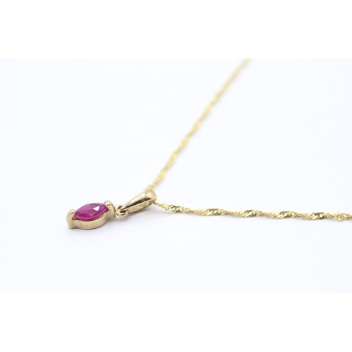 103 - 9ct gold marquise cut red gemstone pendant necklace (1.4g)