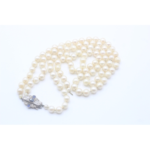 110 - 15ct gold & palladium antique cultured pearl necklace with a diamond, sapphire & blue paste clasp (4... 