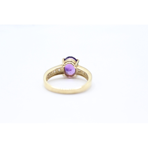 113 - 9ct gold amethyst & white gemstone dress ring (3.1g) Size N