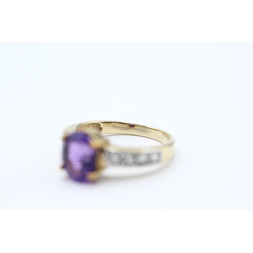 113 - 9ct gold amethyst & white gemstone dress ring (3.1g) Size N