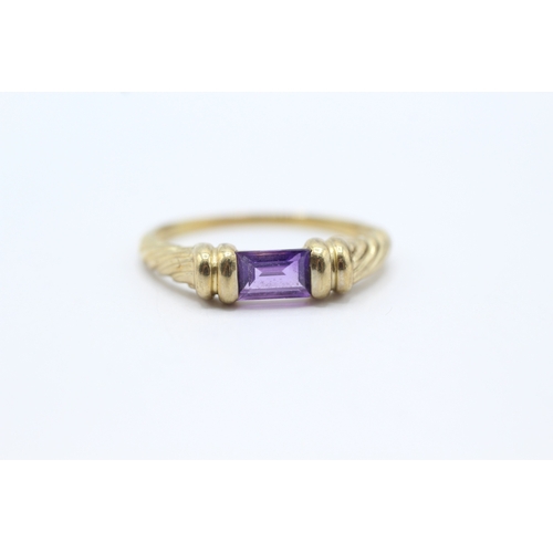 128 - 9ct gold amethyst set solitaire (1.8g) Size S