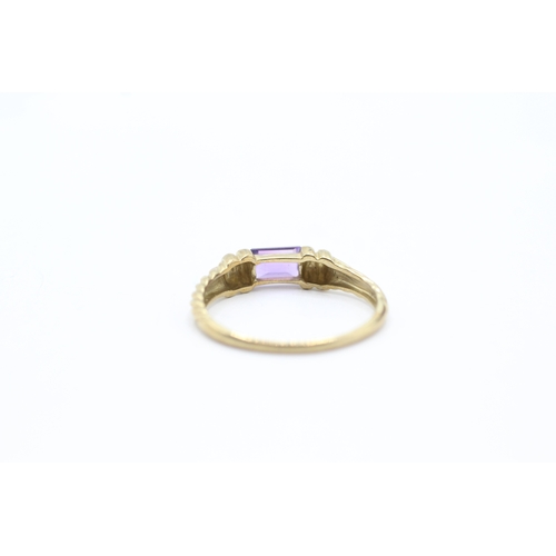 128 - 9ct gold amethyst set solitaire (1.8g) Size S