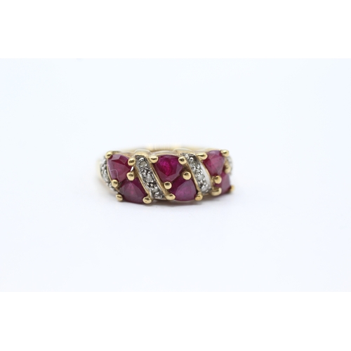 134 - 9ct gold ruby & diamond dress ring (3.6g) Size N