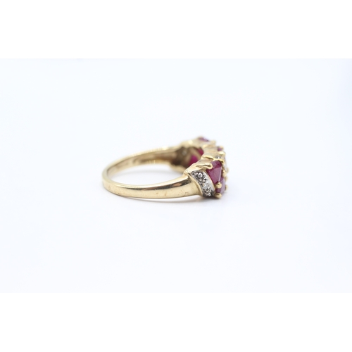 134 - 9ct gold ruby & diamond dress ring (3.6g) Size N