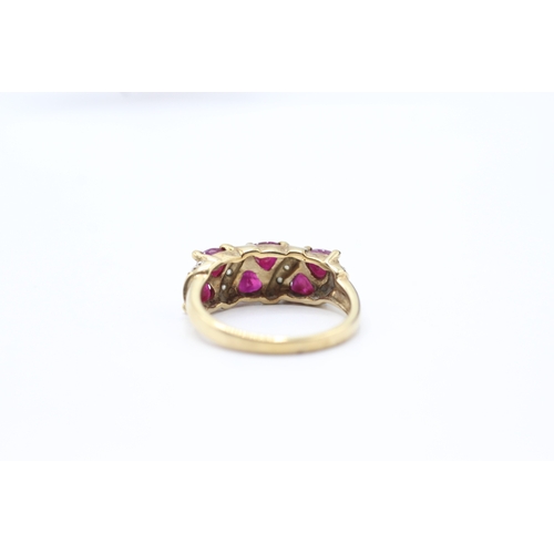 134 - 9ct gold ruby & diamond dress ring (3.6g) Size N