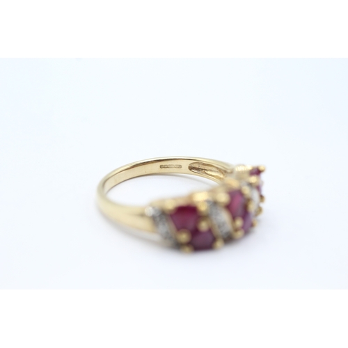 134 - 9ct gold ruby & diamond dress ring (3.6g) Size N