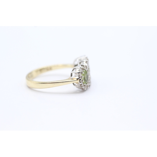 135 - 9ct gold peridot & diamond dress ring (3.4g) Size N