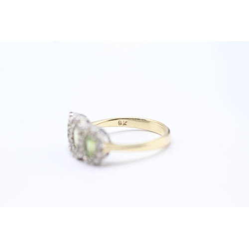 135 - 9ct gold peridot & diamond dress ring (3.4g) Size N