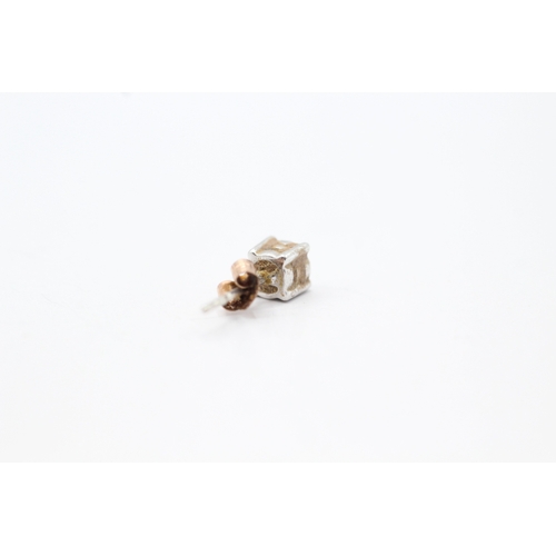 141 - 9ct gold diamond stud earrings (0.9g)