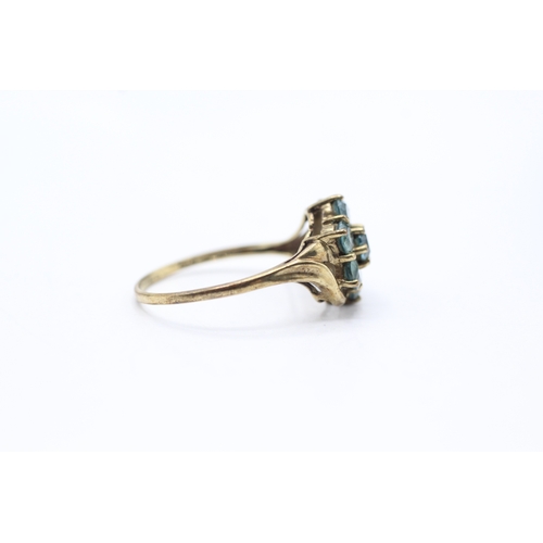 149 - 9ct gold blue gemstone cluster dress ring (2.7g) Size U