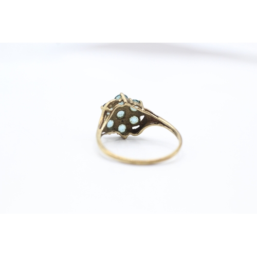 149 - 9ct gold blue gemstone cluster dress ring (2.7g) Size U