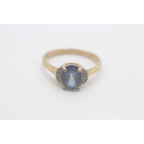 170 - 9ct gold blue gemstone & diamond dress ring (3g) Size S