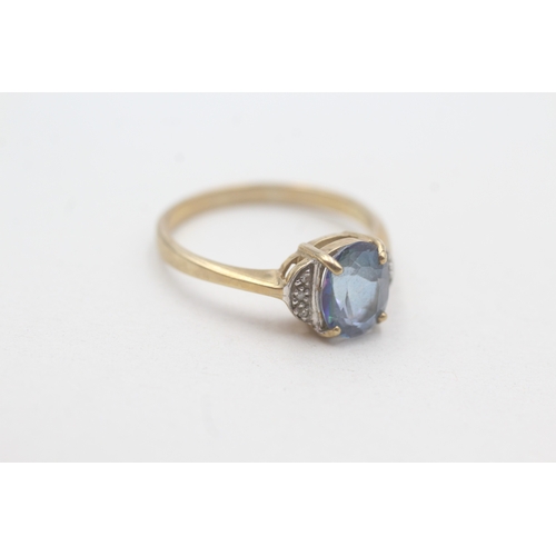 170 - 9ct gold blue gemstone & diamond dress ring (3g) Size S