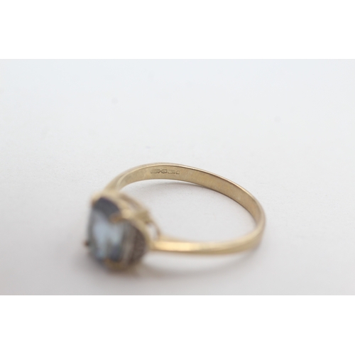 170 - 9ct gold blue gemstone & diamond dress ring (3g) Size S