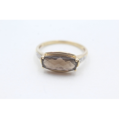 178 - 9ct gold faceted smokey quartz & diamond dress ring (2.6g) Size T