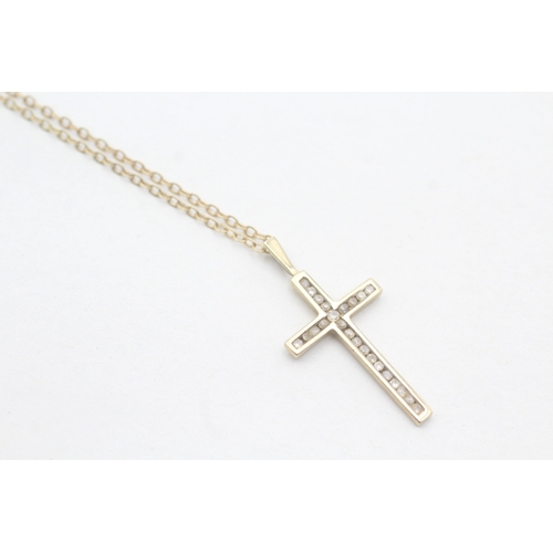 18 - 9ct gold diamond set cross pendant necklace (2.3g)