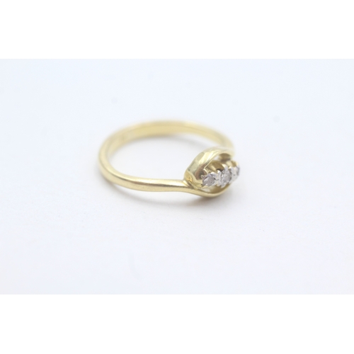 182 - 18ct gold diamond twist ring (2.7g) Size I 1/2