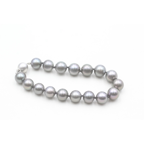 19 - 14ct gold cultured pearl bracelet (23.1g)