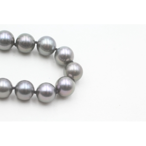 19 - 14ct gold cultured pearl bracelet (23.1g)