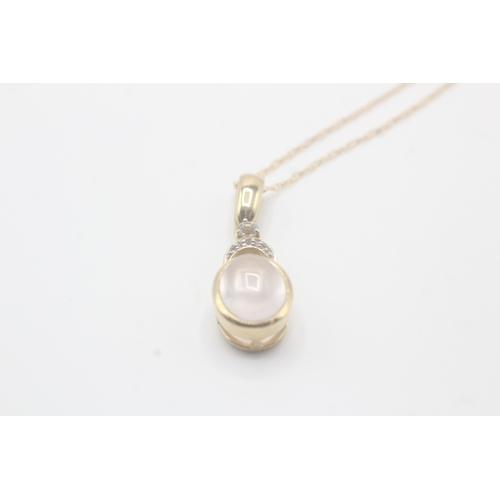 190 - 9ct gold cabochon cut rose quartz & white gemstone pendant necklace (4.8g)