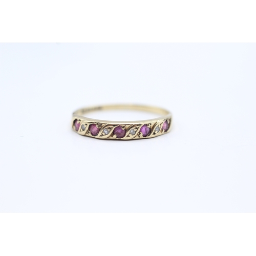 198 - 9ct gold ruby & diamond half eternity ring (1.1g) Size M