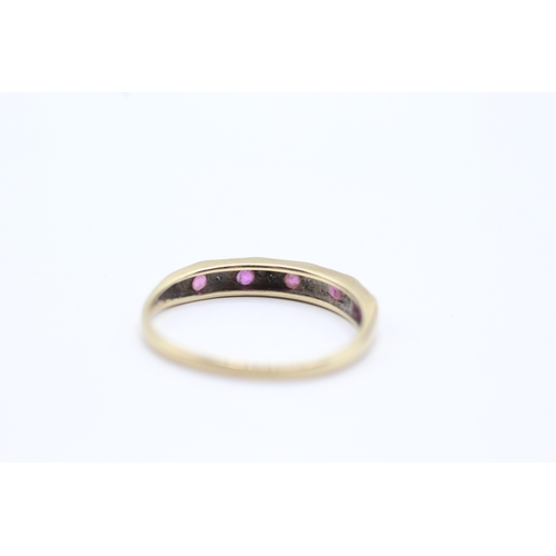 198 - 9ct gold ruby & diamond half eternity ring (1.1g) Size M