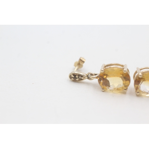 202 - 9ct gold oval cut citrine drop earrings (3.1g)