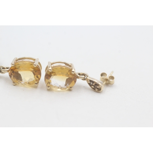 202 - 9ct gold oval cut citrine drop earrings (3.1g)