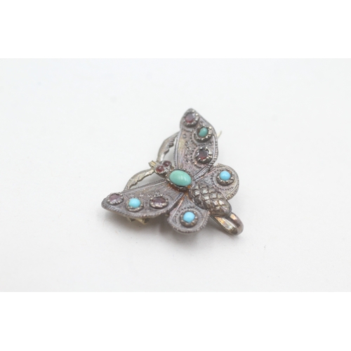 210 - 15ct gold Victorian garnet & turquoise butterfly brooch with a 9ct gold bail & base pin (3.1g)