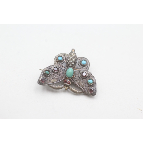 210 - 15ct gold Victorian garnet & turquoise butterfly brooch with a 9ct gold bail & base pin (3.1g)