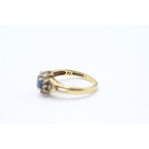 211 - 18ct gold sapphire and diamond ring (2.8g) Size K