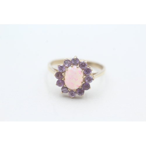 214 - 9ct gold opal & amethyst dress ring (2.6g) Size P