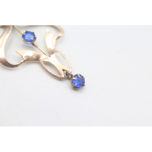 218 - 9ct gold blue paste art nouveau pendant (1g)