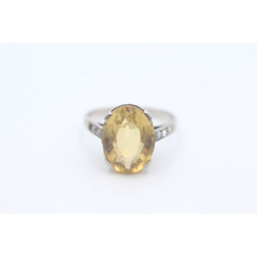 240 - 18ct white gold citrine single stone ring with diamond set shoulders (3.8g) - stone missing Size M