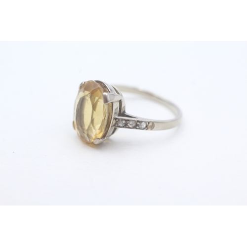 240 - 18ct white gold citrine single stone ring with diamond set shoulders (3.8g) - stone missing Size M